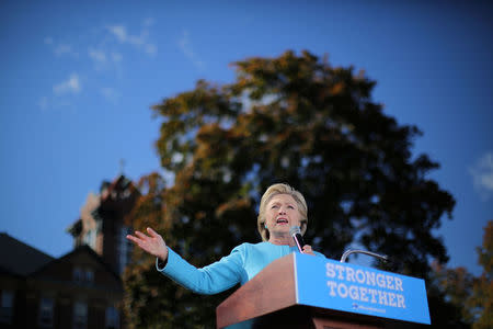 Democratic U.S. presidential nominee Hillary Clinton speaks during a campaign rally at Alumni Hall Courtyard, Saint Anselm College in Manchester, New Hampshire U.S., October 24, 2016. REUTERS/Carlos Barria