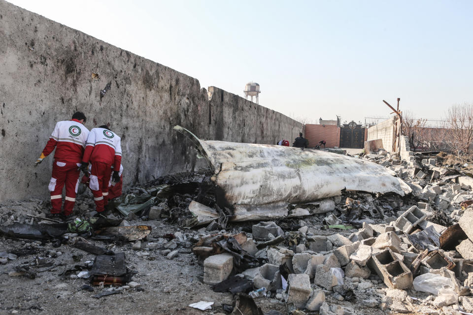 08 January 2020, Iran, Shahedshahr: Rescue workers search the scene, where the Ukrainian plane crashed. A Ukrainian airplane carrying 176 people crashed on Wednesday shortly after takeoff from Tehran airport, killing all onboard. Photo: Mahmoud Hosseini/dpa (Photo by Mahmoud Hosseini/picture alliance via Getty Images)