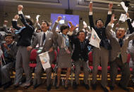 FILE - In this Sept. 7, 2013, file photo, then Japan's Prime Minister Shinzo Abe, second from right, and other members of the Japanese delegation celebrate as then International Olympic Committee (IOC) President Jacques Rogge announces that Tokyo will host the 2020 Olympic Games during the 125th IOC session in Buenos Aires, Argentina. (Ian Watson/Pool Photo via AP, File)