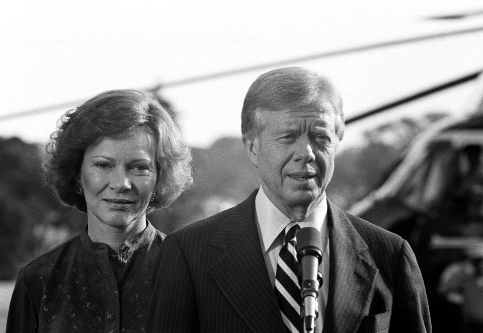 U.S. President Jimmy Carter, First Lady Rosalynn at his side, tells reporters at the White House in Washington, Friday, Oct. 17, 1980 that he has accepted an invitation by the League of Women Voters to debate Republican presidential candidate Ronald Reagan October 28 in Cleveland, Ohio. The Carter faced reporters prior to leaving for Camp David, the presidential retreat in the Maryland Mountains.