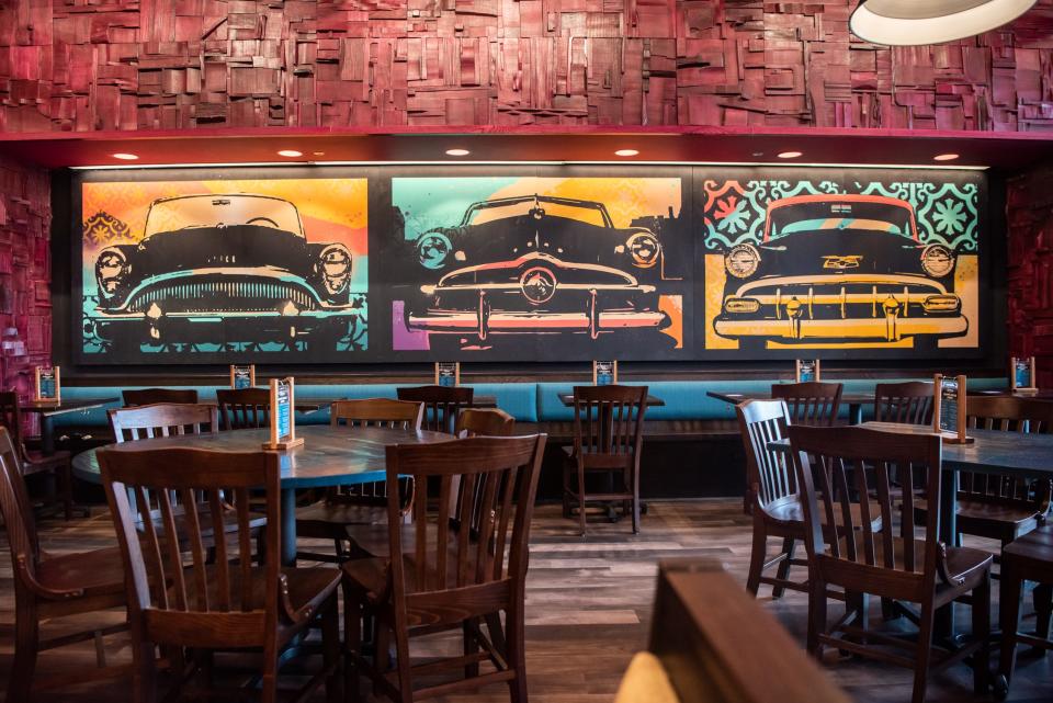 Custom graphic murals commissioned by Tampa-based artist, Leon “Tes One” Bedore, line the walls of Bomba Taco + Bar, which opened its fifth location in Newtown last month.