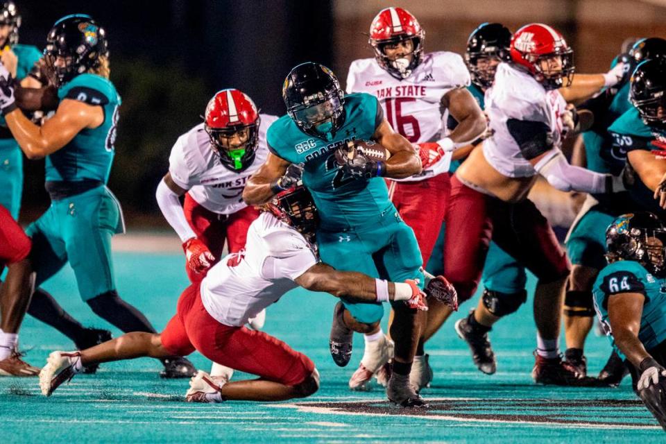Coastal’s Reese White runs the ball against Jacksonville State defenders. Coastal Carolina University takes on Jacksonville State in the chanticleers first home game of the 2023 football season. Sept. 9, 2023.