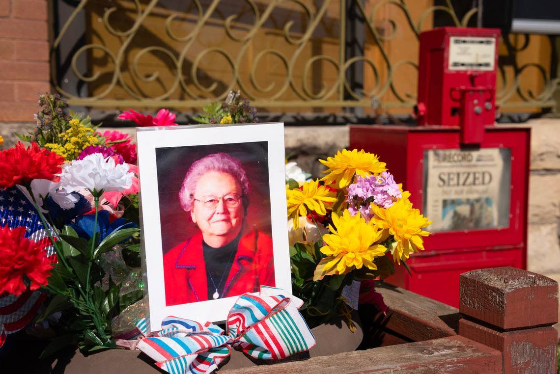 A makeshift shrine is set up in front of the Marion County Record in Marion. The funeral for the newspaper’s co-owner Joan Meyer was in August in Marion, a week after she died following a police raid at her house and the paper. Jaime Green/File photo