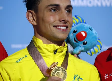 Diving - Gold Coast 2018 Commonwealth Games - Men's 10m Platform Medal Ceremony - Optus Aquatic Centre - Gold Coast, Australia - April 14, 2018. Gold medalist Domonic Bedggood of Australia. REUTERS/David Gray