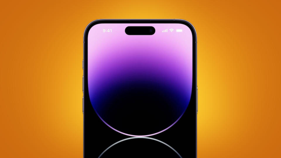 iPhone 14 Pro on an orange background