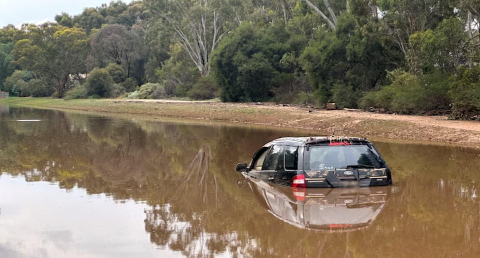 A submerged Ford Territory after the flood