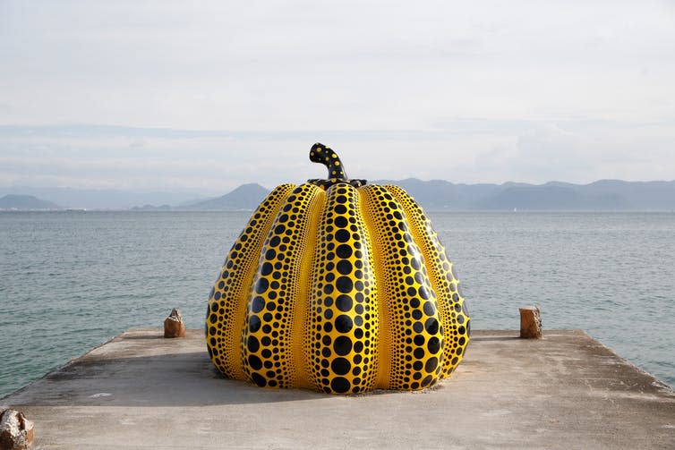 <span class="caption">Pumpkin by the sea by Yayoi Kusama, </span><span class="attribution"><span class="source">Shutterstock</span></span>