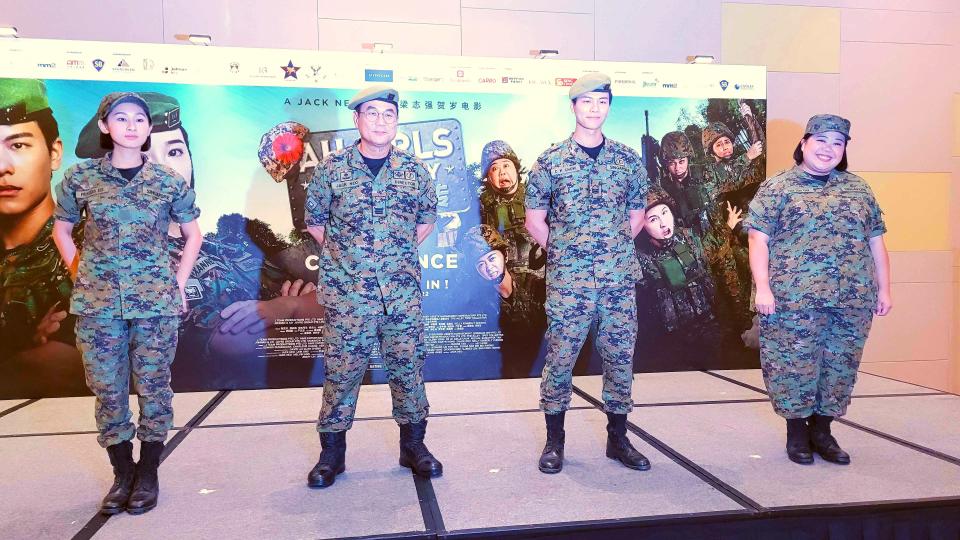 Filmmaker Jack Neo (2nd from left) with the cast of Ah Girls Go Army, Yang Guang Ke Le, Glenn Yong and Xixi Lim, at a press conference on 28 Jan 2022. (Photo: Teng Yong Ping)