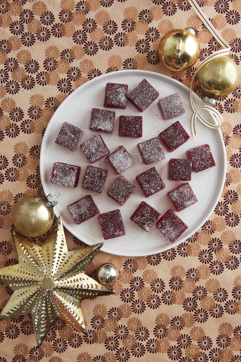 <p>These simple sweet treats—made from cranberries, cinnamon, and fruit pectin—are absolutely delectable.</p><p><strong><a href="https://www.countryliving.com/food-drinks/a34374131/cranberry-pate-de-fruit-recipe/" rel="nofollow noopener" target="_blank" data-ylk="slk:Get the recipe;elm:context_link;itc:0;sec:content-canvas" class="link ">Get the recipe</a>.</strong></p><p><strong><a class="link " href="https://www.amazon.com/USA-Pan-Bakeware-Nonstick-Aluminized/dp/B0029JMMRE/?tag=syn-yahoo-20&ascsubtag=%5Bartid%7C10050.g.34473510%5Bsrc%7Cyahoo-us" rel="nofollow noopener" target="_blank" data-ylk="slk:SHOP BAKING PANS;elm:context_link;itc:0;sec:content-canvas">SHOP BAKING PANS</a><br></strong></p>