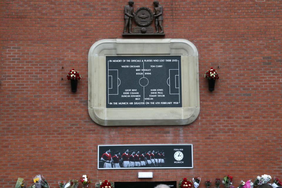 <p>Fans gather at the memorial for the 23 who died in the Munich air crash in 1958</p>