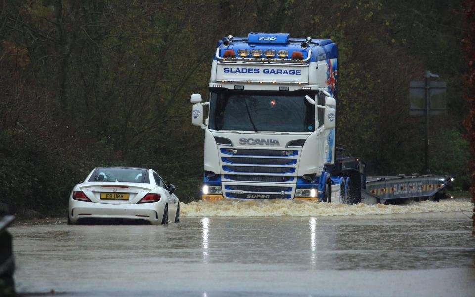 The flooded main A358 route to Chard in Somerset at Donyatt in Somerset