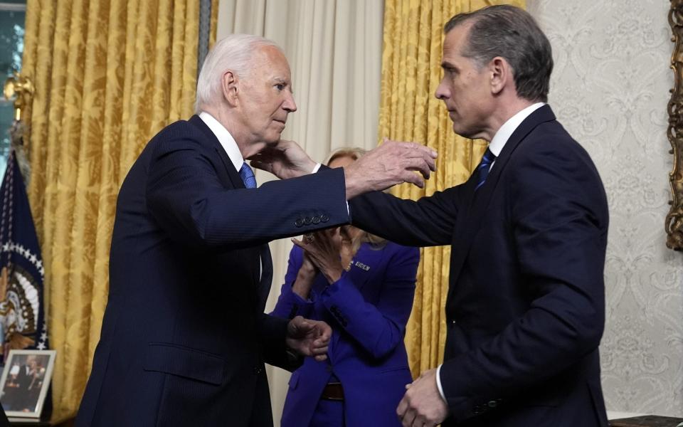 Biden embraces son Hunter Biden