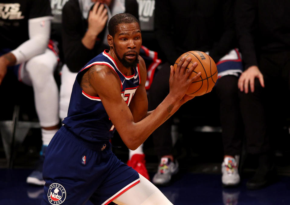 NEW YORK, NEW YORK - APRIL 25: Kevin Durant #7 of the Brooklyn Nets takes the ball during Game Four of the Eastern Conference First Round Playoffs against the Boston Celtics at Barclays Center on April 25, 2022 in the Brooklyn borough of New York City. NOTE TO USER: User expressly acknowledges and agrees that, by downloading and or using this photograph, User is consenting to the terms and conditions of the Getty Images License Agreement. (Photo by Elsa/Getty Images)