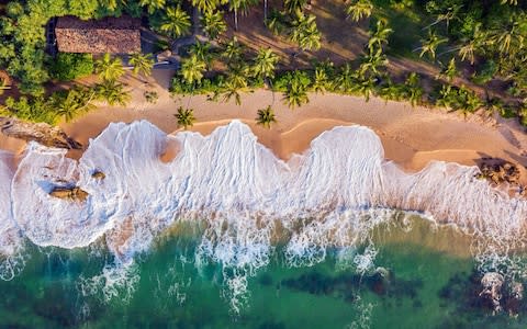 Golden beaches is one of the country's draws - Credit: getty