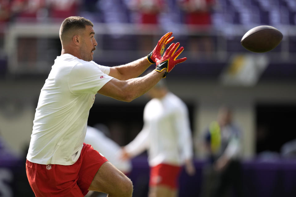 Kansas City Chiefs tight end Travis Kelce warms up before an NFL football game against the Minnesota Vikings, Sunday, Oct. 8, 2023, in Minneapolis. (AP Photo/Abbie Parr)