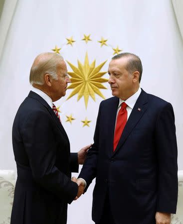 Turkish President Tayyip Erdogan (R) meets with U.S. Vice President Joe Biden at the Presidential Palace in Ankara, Turkey, August 24, 2016. Kayhan Ozer/Presidential Palace/Handout via REUTERS