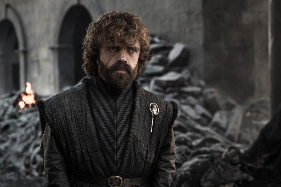 But by Season 8, there's an almost visual distance between Tyrion and his family, as his hair is significantly darker, and his full beard is entirely brown. He's marked now with that scar across his cheek, and he's abandoned the gold and crimson of his House and his previous costumes. Now he's in a simple, no-frills tunic in the earth-tones of the north, and the Hand pin on his lapel shows that in his maturity, he's finally found his place, and that it isn't on the battlefield.