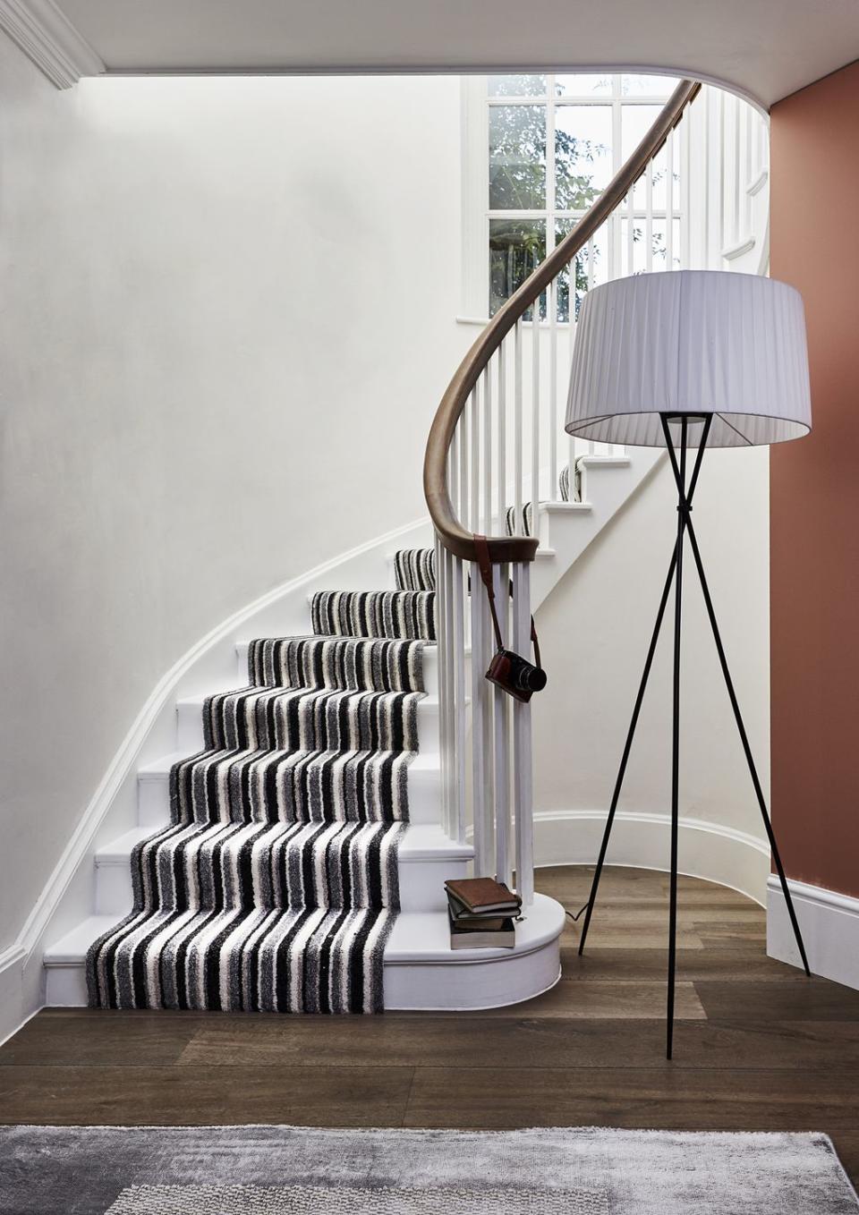 <p>As well as drawing attention, striped carpets help create the illusion of a bigger space, which is great for a smaller <a href="https://www.housebeautiful.com/uk/decorate/a36379892/interior-tweaks-happy-home/" rel="nofollow noopener" target="_blank" data-ylk="slk:home;elm:context_link;itc:0;sec:content-canvas" class="link ">home</a>. </p><p>'Often the first thing you see when entering a house, the stairs and hallway create a first and lasting impression on your guests,' says Jemma Dayman, Buyer, Carpets and Rugs at Carpetright. 'It's the perfect area to take risks and be daring with your styling.'</p><p>Pictured: <a href="https://www.carpetright.co.uk/carpets/" rel="nofollow noopener" target="_blank" data-ylk="slk:Boston Stripes by Carpetright;elm:context_link;itc:0;sec:content-canvas" class="link ">Boston Stripes by Carpetright</a></p>