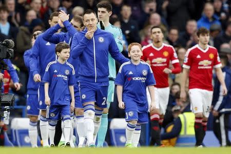 Football Soccer - Chelsea v Manchester United - Barclays Premier League - Stamford Bridge - 7/2/16 Chelsea's John Terry leads the team out before the match Action Images via Reuters / John Sibley/Livepic