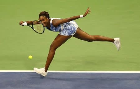 Sep 8, 2015; New York, NY, USA; Venus Williams of the United States hits to Serena Williams of the United States on day nine of the 2015 U.S. Open tennis tournament at USTA Billie Jean King National Tennis Center. Mandatory Credit: Jerry Lai-USA TODAY Sports