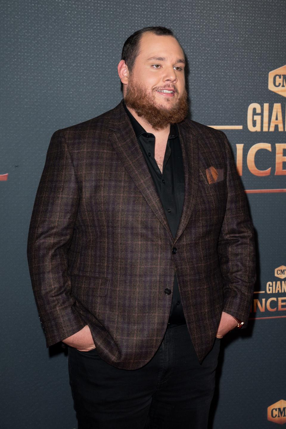 Luke Combs arrives on the red carpet for the taping of the CMT Giants: Vince Gill special at The Fisher Center for the Performing Arts in Nashville, Tenn., Monday, Sept. 12, 2022.