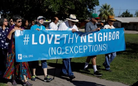 People protest against the Trump administration policy of separating immigrant families - Credit: REUTERS/Mike Blake