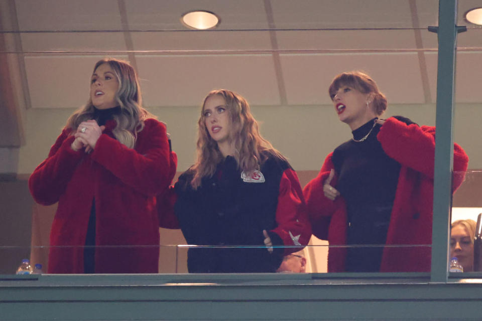 Brittany Mahomes (C) and Taylor Swift (R) react during the game between the Kansas City Chiefs and the Green Bay Packers at Lambeau Field on December 03, 2023 in Green Bay, Wisconsin.