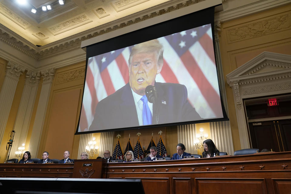 FILE - A video of former President Donald Trump is shown on a screen, as the House select committee investigating the Jan. 6 attack on the U.S. Capitol holds its final meeting on Capitol Hill in Washington, Monday, Dec. 19, 2022. (AP Photo/J. Scott Applewhite, File)