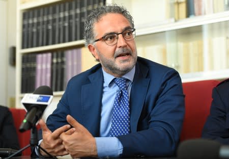 Palermo Police Chief, Renato Cortese talks during a news conference after a coordinated crackdown with U.S. police against major crime families looking to rebuild their mafia powerbase in Palermo