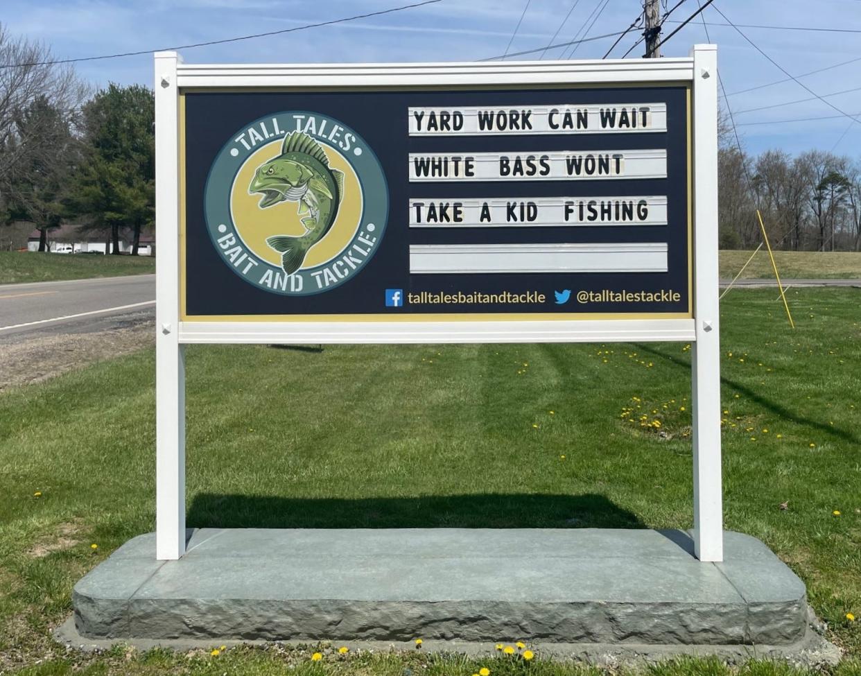 The sign in front of an Alliance-area bait and tackle store is an invitation to anglers to check out the annual white bass spawning run on the Mahoning River.