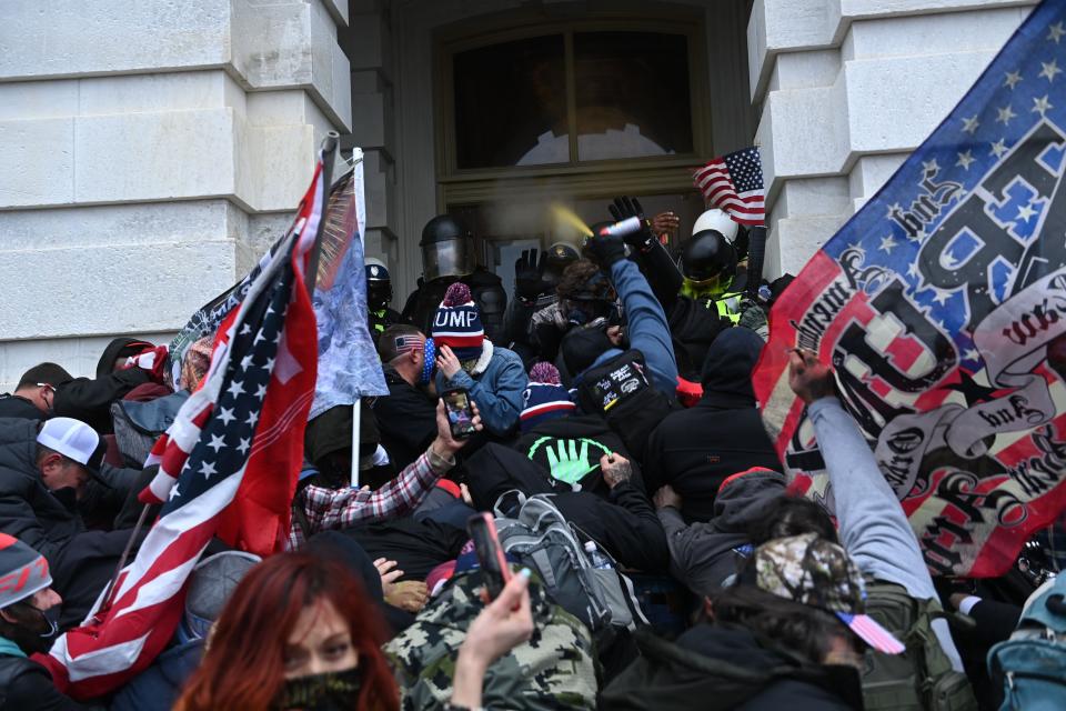 Thousands of Trump supporters flooded Washington and pushed into the Capitol to try to stop the certification of Joe Biden's election victory. (Brendan Smialowski/Getty Images)