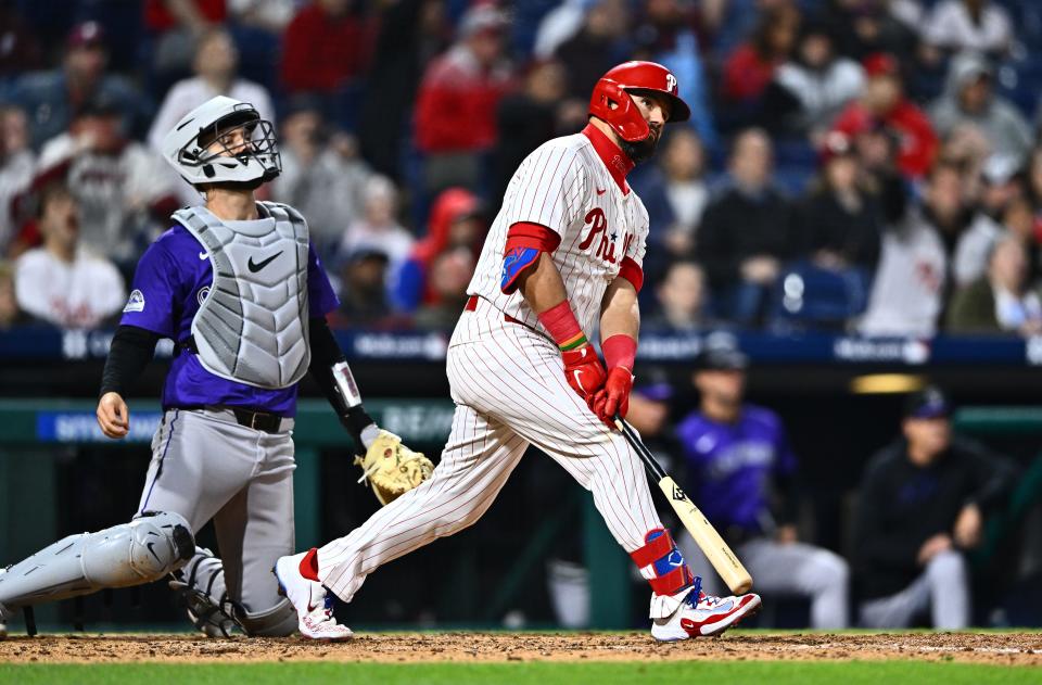 Philadelphia Phillies designated hitter Kyle Schwarber watches after hitting a two-run home run against the Colorado Rockies in the sixth inning Wednesday, April 17, 2024, at Citizens Bank Park in Philadelphia.