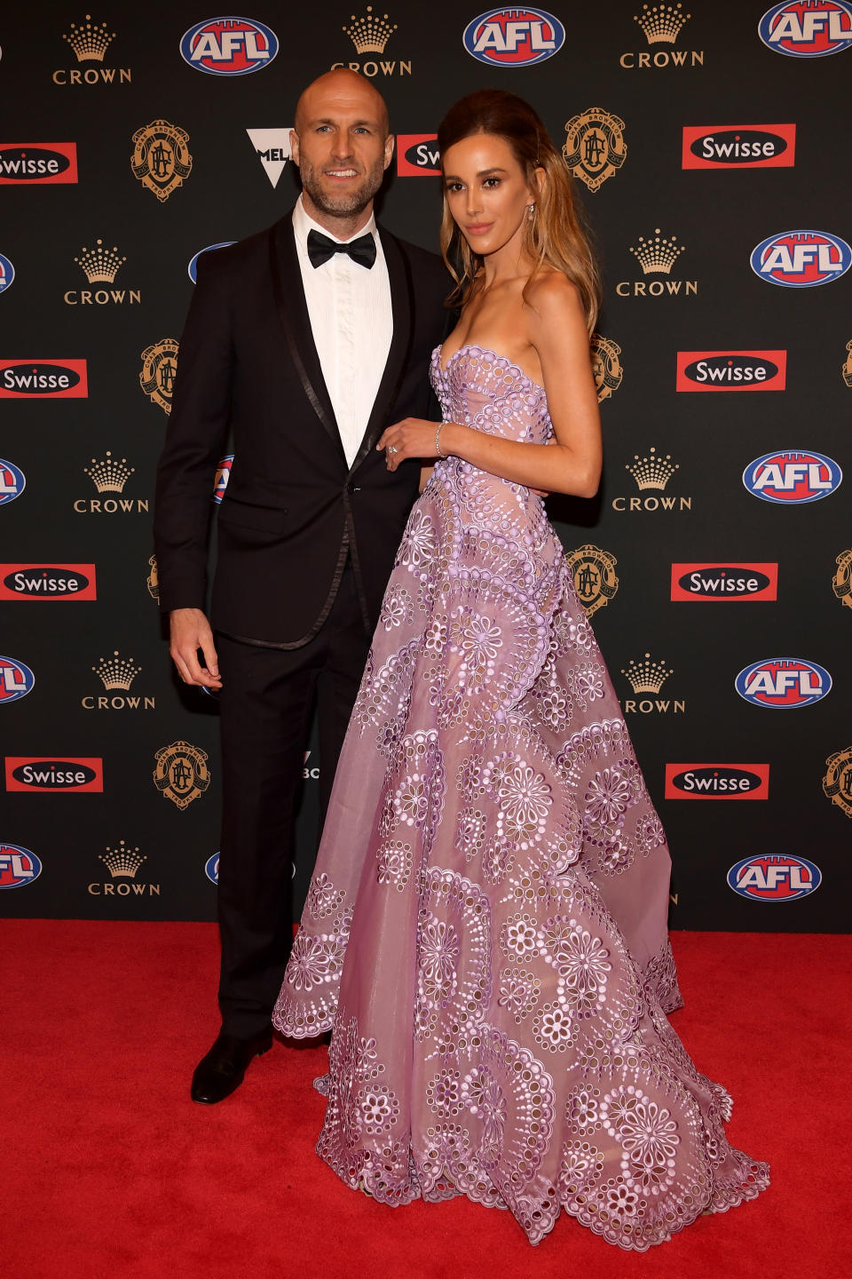 <p>Chris Judd’s wife Bec was dressed to impress in a J’Aton gown.<br>Photo: Getty </p>