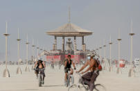 <p>Participants explore the playa as approximately 70,000 people from all over the world gathered for the annual Burning Man arts and music festival in the Black Rock Desert of Nevada, Aug. 28, 2017. (Photo: Jim Urquhart/Reuters) </p>