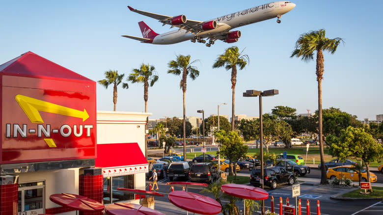 In-N-Out, palm trees, and airplane