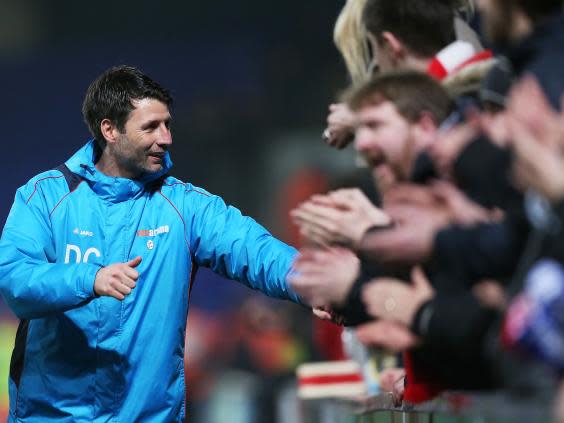 Danny Cowley with Lincoln fans after his side's FA Cup victory over Ipswich (Getty)