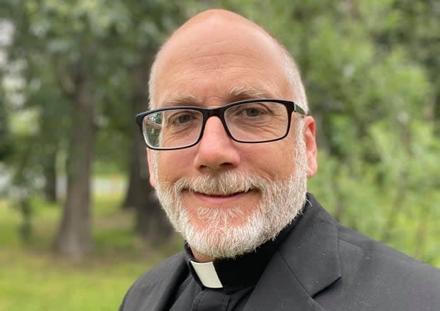 Father Paul Bringleson is pastor at St. Ann's Parish in Flin Flon, Man. He says parishoners should be able to put questions to leaders in the Roman Catholic Church about its role in running Canada's residential schools. (Paul Bringleson/Facebook - image credit)