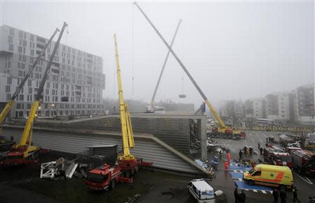 A general view of the rescue operation of a collapsed supermarket in capital Riga November 22, 2013. REUTERS/Ints Kalnins