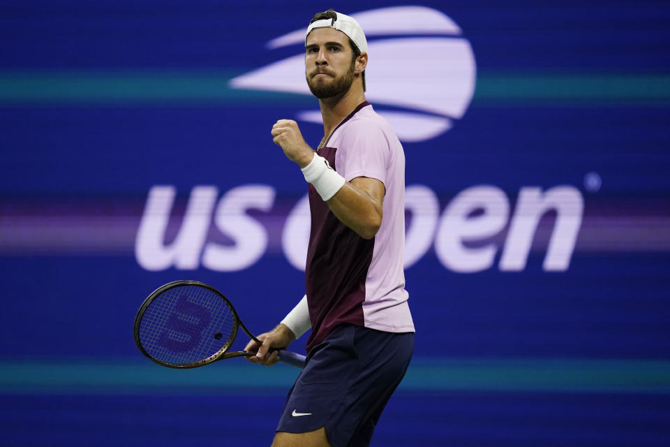 Karen Khachanov, of Russia, reacts after winning a point against Nick Kyrgios, of Australia, during the quarterfinals of the U.S. Open tennis championships, Tuesday, Sept. 6, 2022, in New York. (AP Photo/Charles Krupa)