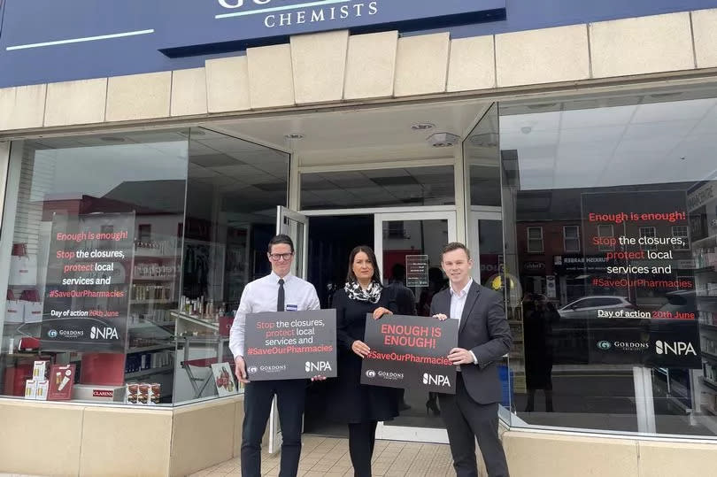 Upper Bann MLA Eóin Tennyson of Alliance lends his support in Banbridge, accompanied by Oliver Kearney (pharmacy manager) and Jill Evans (financial controller) of Gordons Chemists