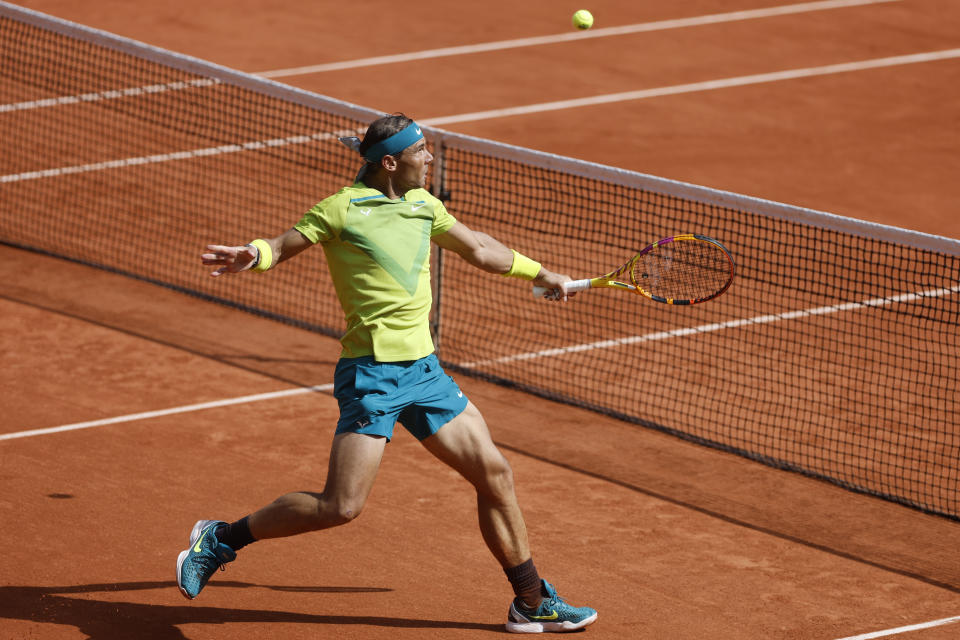 Spain's Rafael Nadal volleys the ball to Norway's Casper Ruud during their final match of the French Open tennis tournament at the Roland Garros stadium Sunday, June 5, 2022 in Paris. (AP Photo/Jean-Francois Badias)