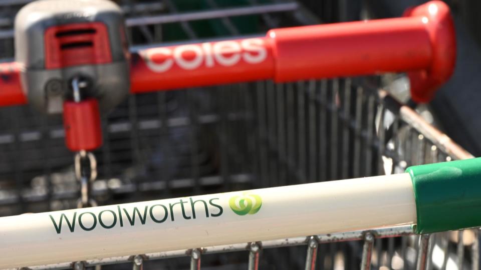 Woolworths and Coles Supermarket signage