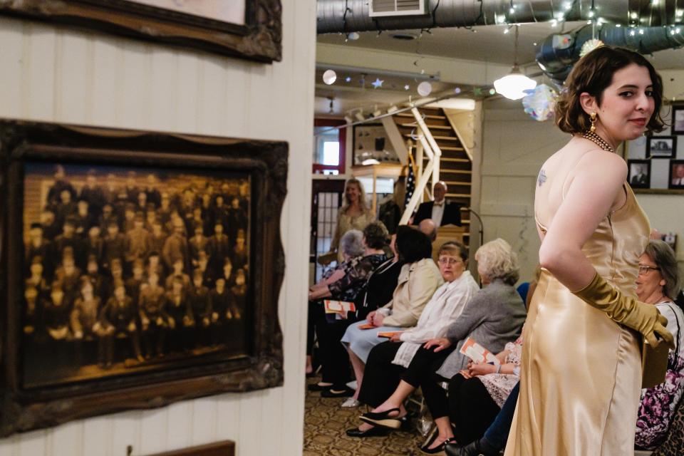 Sarah Spies works the runway at the "Sign of the Times Vintage Fashion Show" at the Reeves Museum. Fashion shows at the museum have been running for 28 years. The show, held May 8, was designed around the 12 zodiac signs. "Each elemental sign corresponded to how each person has decided to dress," museum Director Shelagh K. Pruni said. All clothing was donated by members the community.