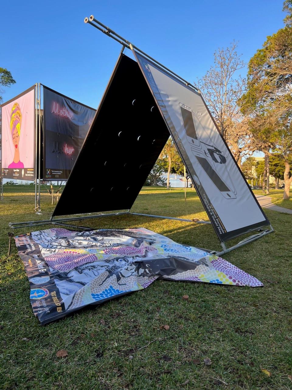 Vandalized artwork at the annual "Embracing Our Differences" art exhibit at Bayfront Park.