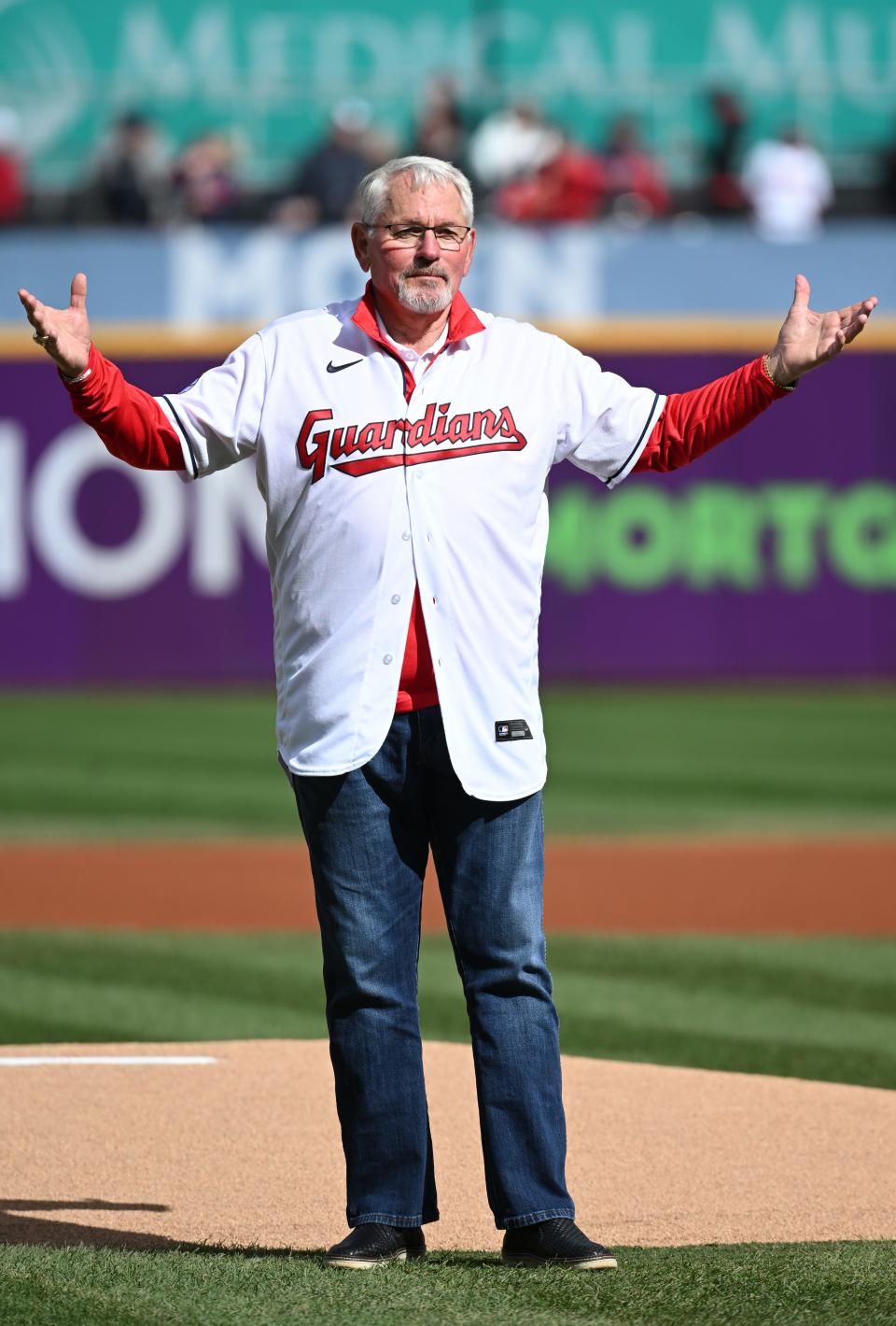 Former Cleveland manager Mike Hargrove throws out the first pitch before the start of Game 2 of the Guardians' 2022 wild card playoff series against the Tampa Bay Rays, in Cleveland.