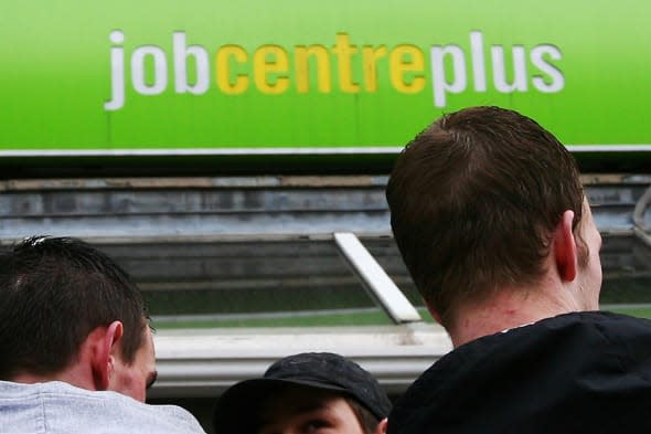 File photo dated 19/03/09 of a group of men outside a Job Centre Plus branch as a shortage of skilled workers in some industries is a 