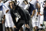 Virginia coach Bronco Mendenhall watches during the first half of the team's NCAA college football game against North Carolina in Chapel Hill, N.C., Saturday, Sept. 18, 2021. (AP Photo/Gerry Broome)