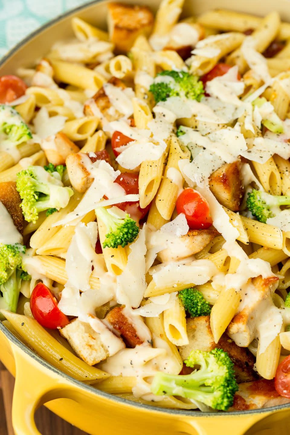 <p>This is the perfect side for your next BBQ. </p><p>Get the <a href="https://www.delish.com/uk/cooking/recipes/a29260396/chicken-caesar-pasta-salad-recipe/" rel="nofollow noopener" target="_blank" data-ylk="slk:Chicken Caesar Pasta Salad;elm:context_link;itc:0;sec:content-canvas" class="link ">Chicken Caesar Pasta Salad</a> recipe.</p>