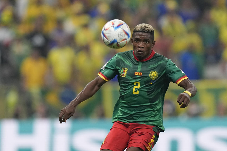 Cameroon's Jerome Ngom Mbekeli controls a ball during the World Cup group G soccer match between Cameroon and Brazil, at the Lusail Stadium in Lusail, Qatar, Friday, Dec. 2, 2022. (AP Photo/Pavel Golovkin)