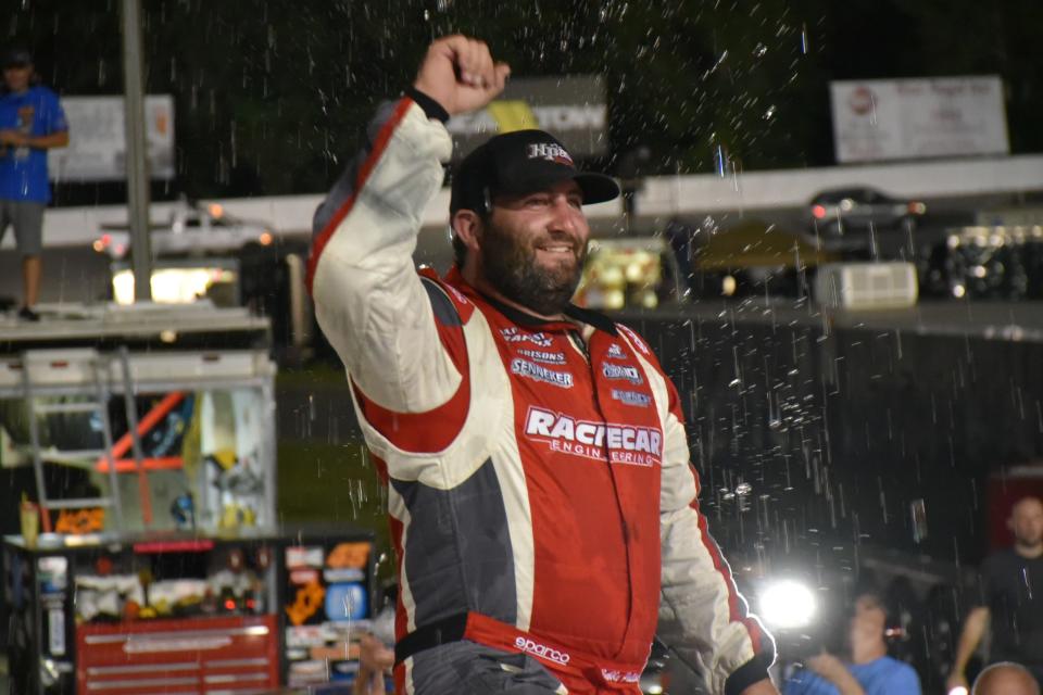 Bubba Pollard (left) celebrates his win in the Rowdy Energy Twin 100’s for Super Late Model machines race at Five Flags Speedway on June 27, 2020.